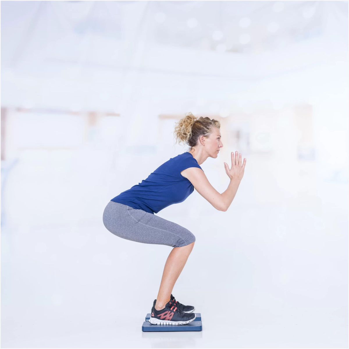 K-Plates being used during a squat